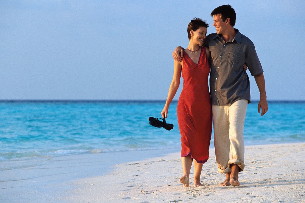 Couple Strolling on Beach