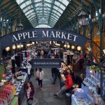 Visitors in Apple Market in Covent Garden in London, UK
